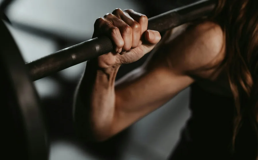 Athlete strength training in a gym