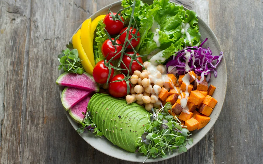 Healthy balanced meal with vegetables and avocado